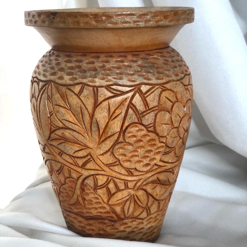 Carved wooden vase
